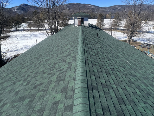 asphalt shingles on large farmhouse